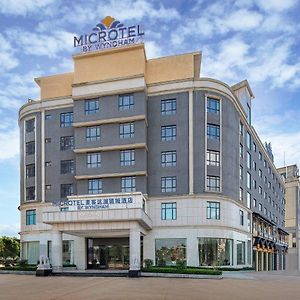 Microtel By Wyndham Heyuan Exterior photo